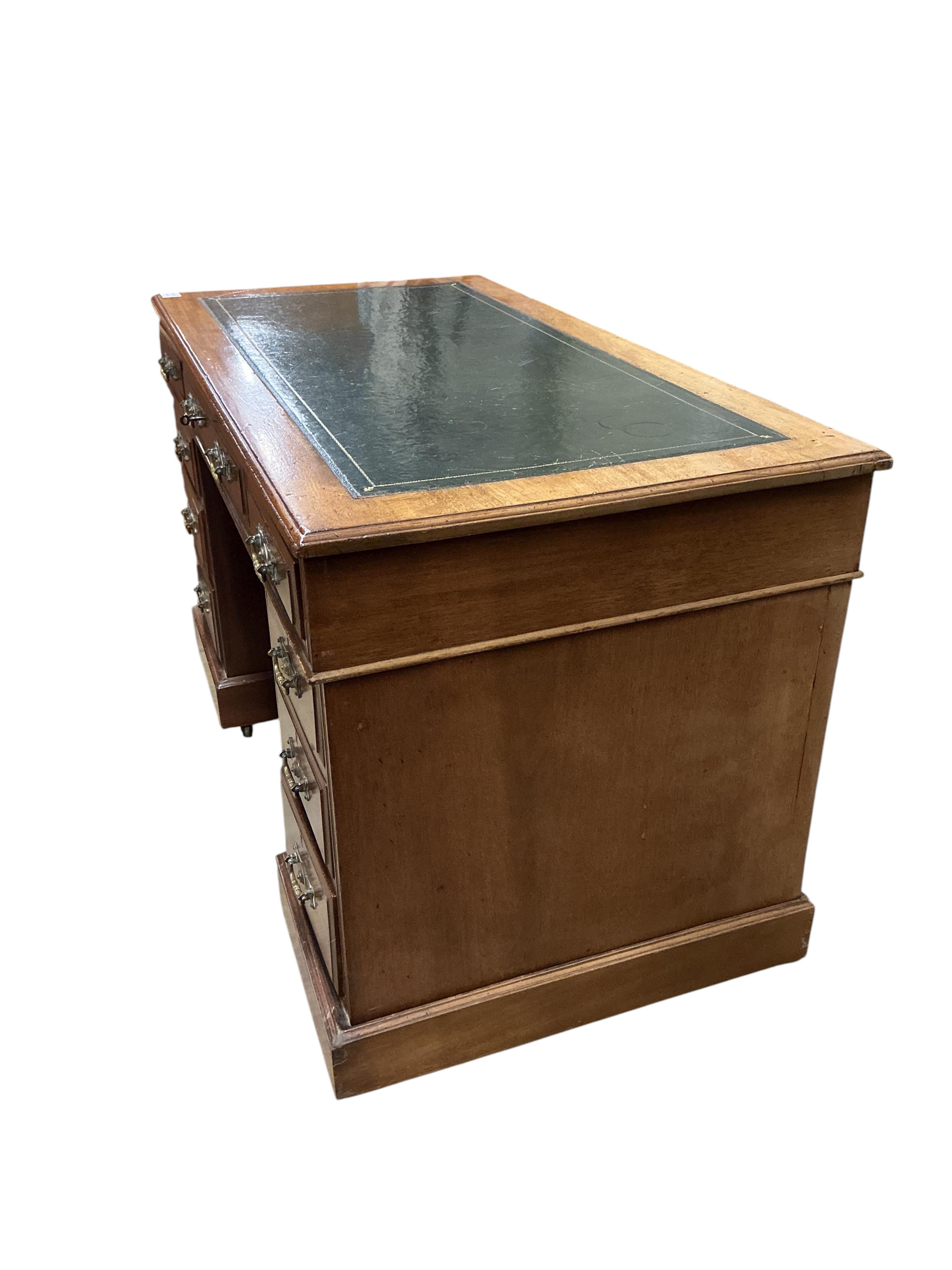 A late Victorian mahogany pedestal desk, width121cm, depth 64cm, height 74cm